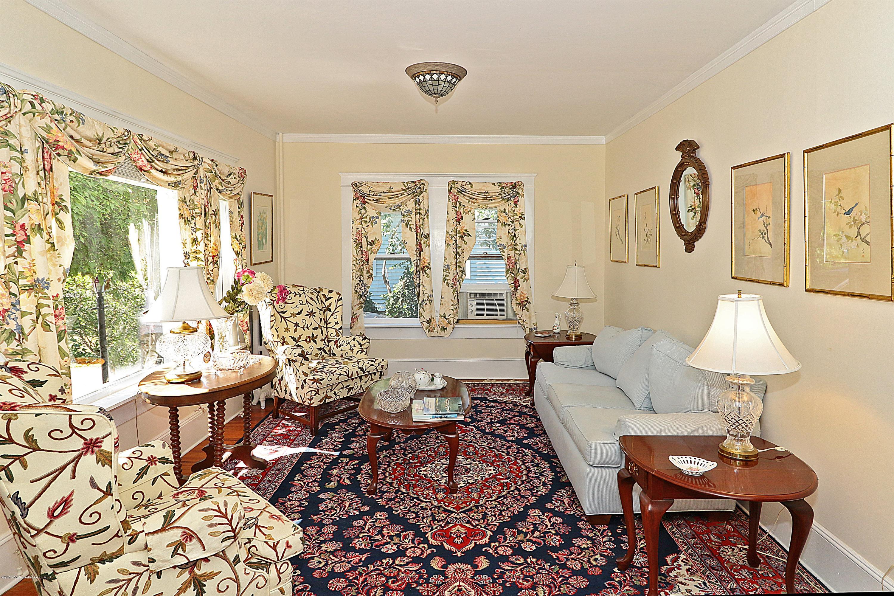 113 Rumson Road Little Silver, NJ 07739 - Photo 8 of 30 a living room with furniture and a window