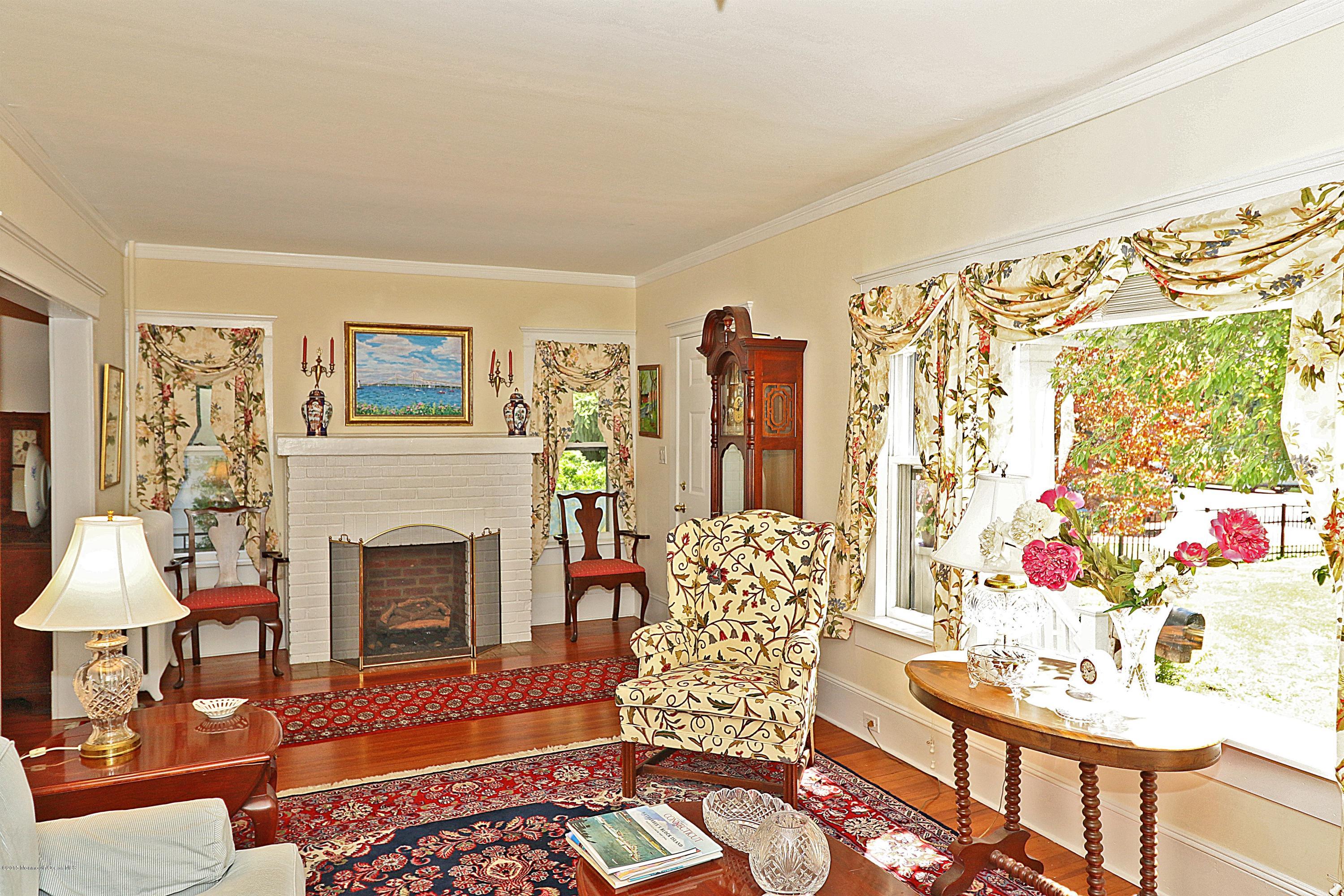 113 Rumson Road Little Silver, NJ 07739 - Photo 9 of 30 a living room with furniture and a fireplace