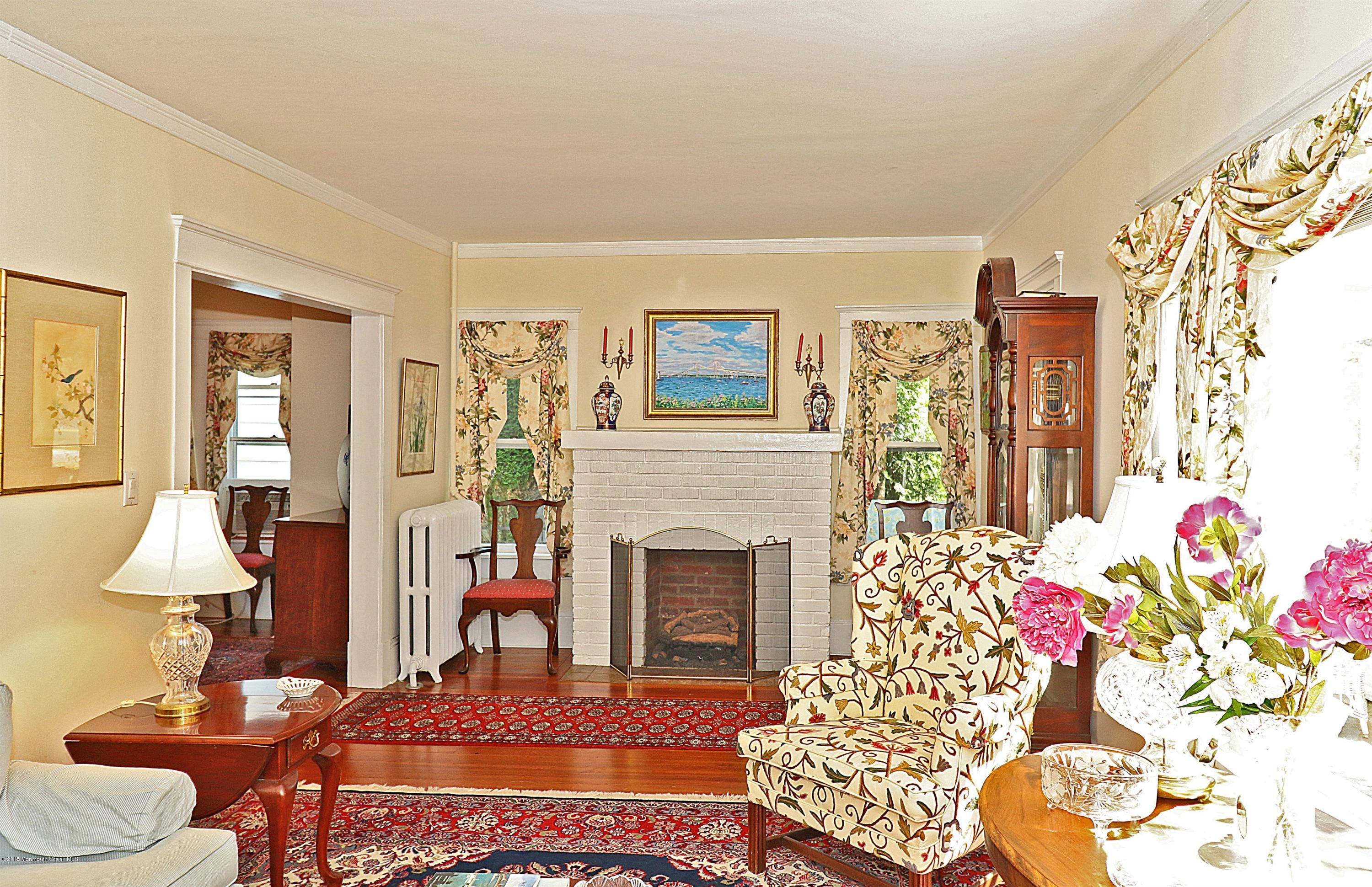 113 Rumson Road Little Silver, NJ 07739 - Photo 10 of 30 a living room with furniture and a fireplace