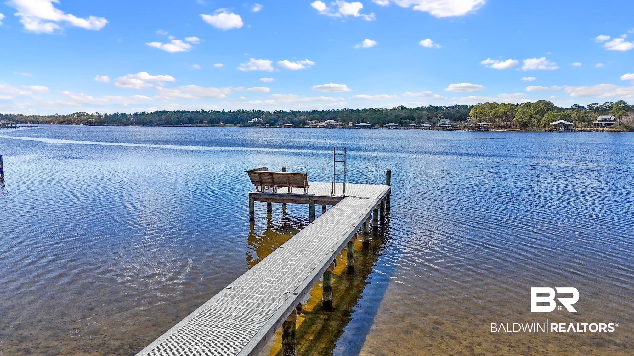 9459 Soldier Creek Road Lillian, AL 36549 - Photo 39 of 54 View of dock with a water view