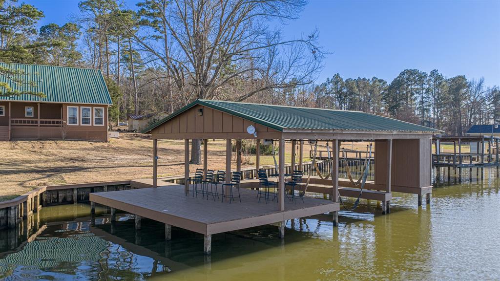 410 Private Road Leesburg, TX 75451 - Photo 27 of 38 a swimming pool view with a seating space