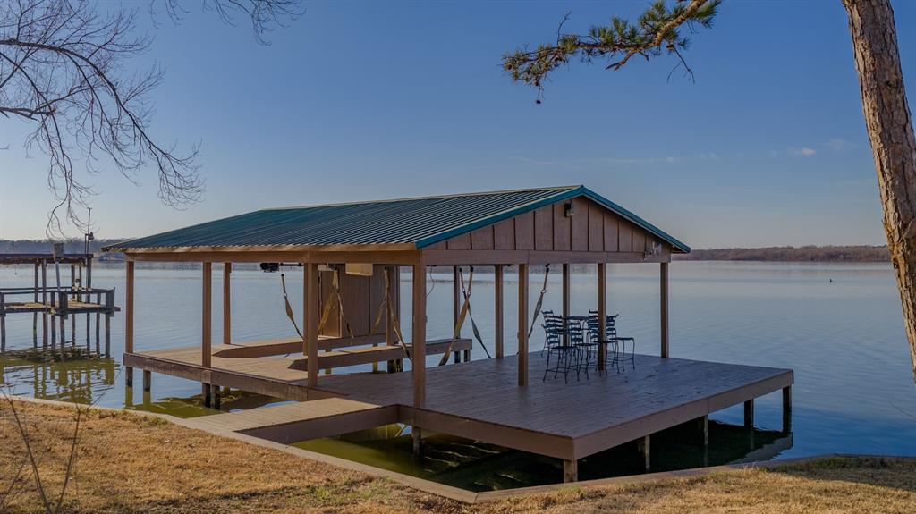 410 Private Road Leesburg, TX 75451 - Photo 28 of 38 a dining room with furniture and window