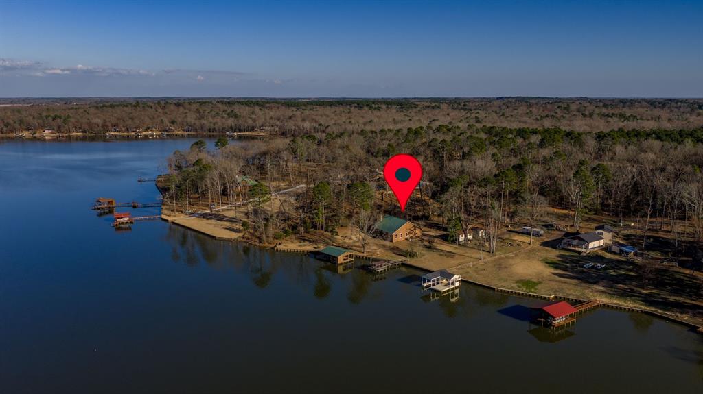 410 Private Road Leesburg, TX 75451 - Photo 35 of 38 a view of a lake