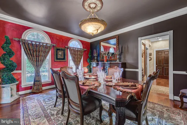 a view of a hallway with a livingroom with furniture
