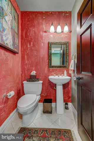 a room with gym equipment and a window