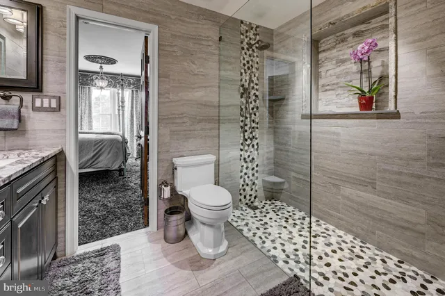 a kitchen with refrigerator and stove