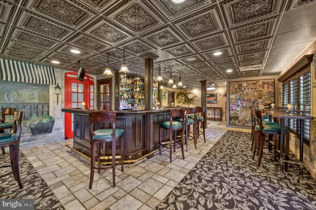 a view of a patio with a table chairs and a table