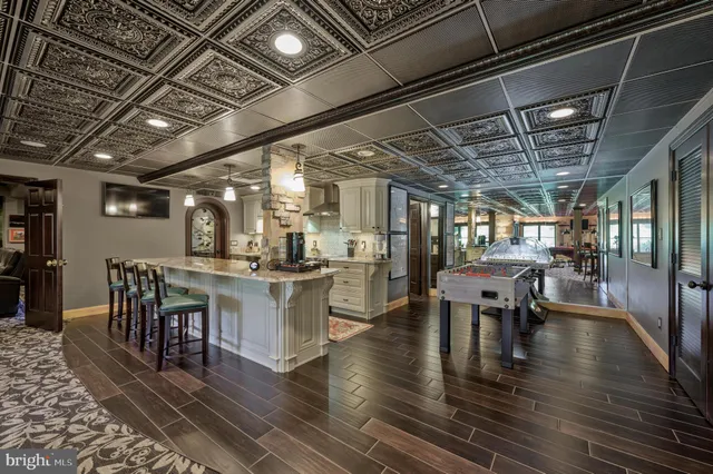 an outdoor space with furniture and garden