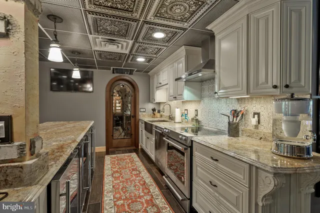 a view of a chair and tables in the balcony