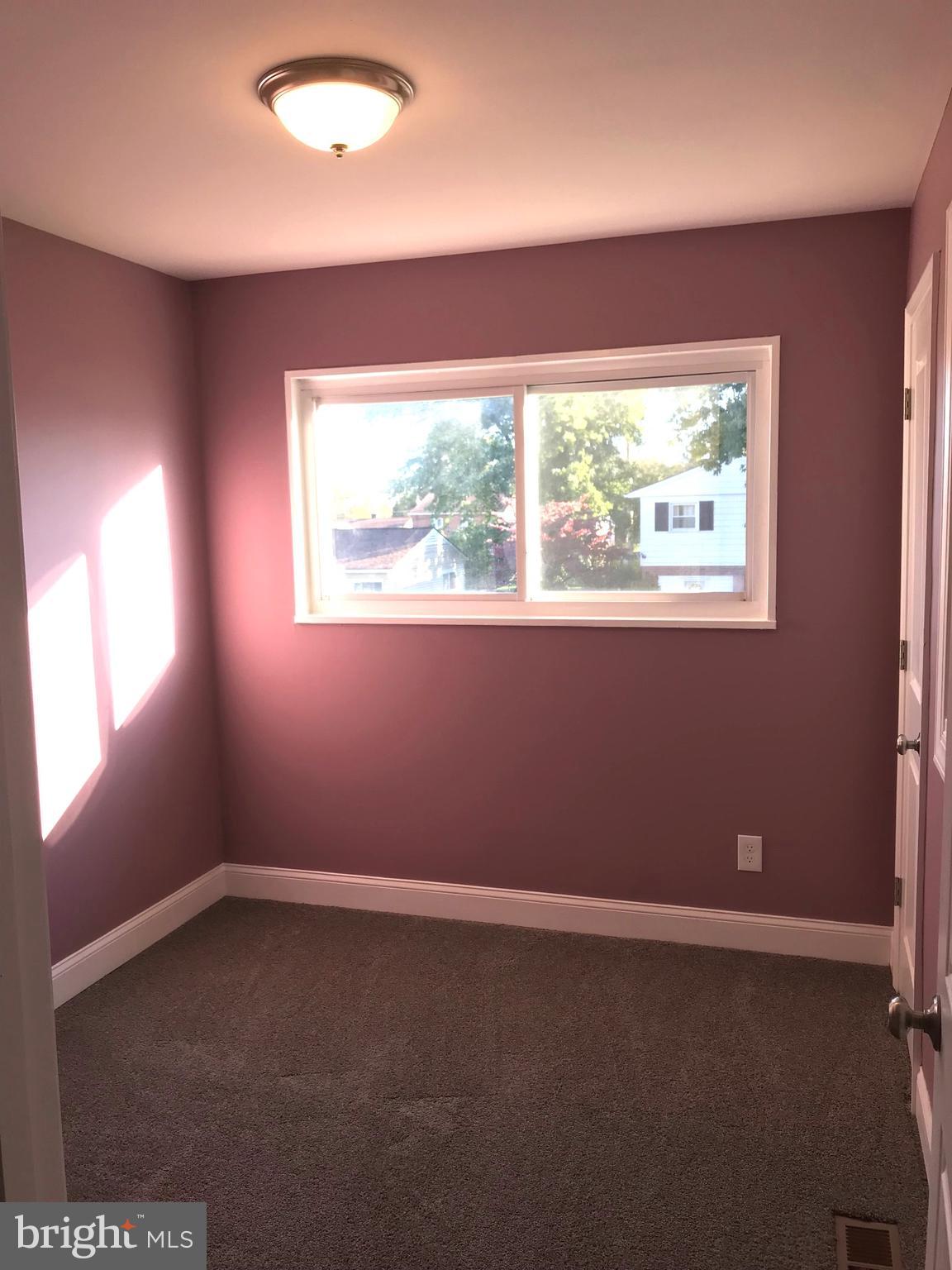 7806 Selgrave Road Baltimore, MD 21244 - Photo 15 of 25 an empty room with a window