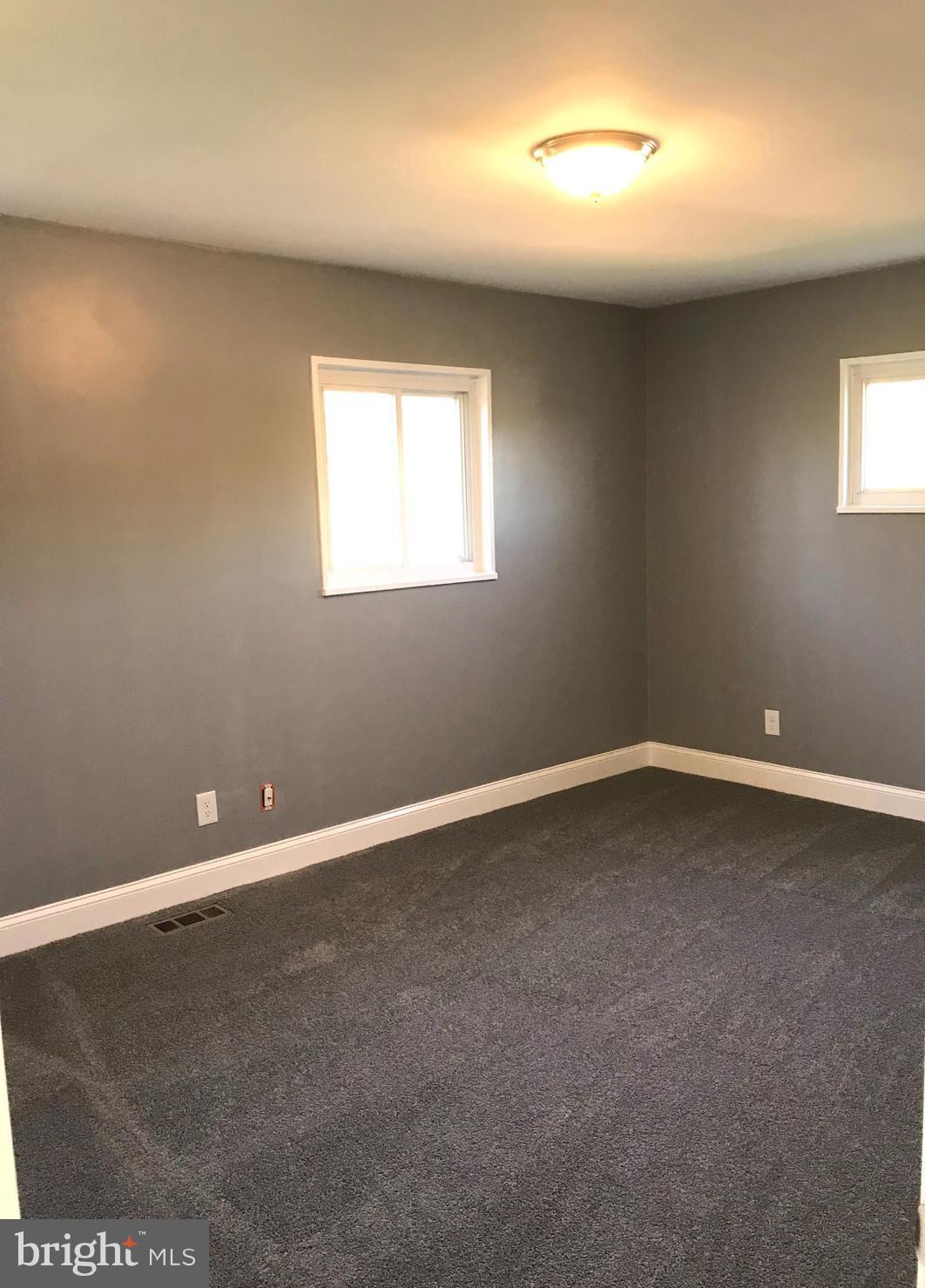 7806 Selgrave Road Baltimore, MD 21244 - Photo 16 of 25 an empty room with a window