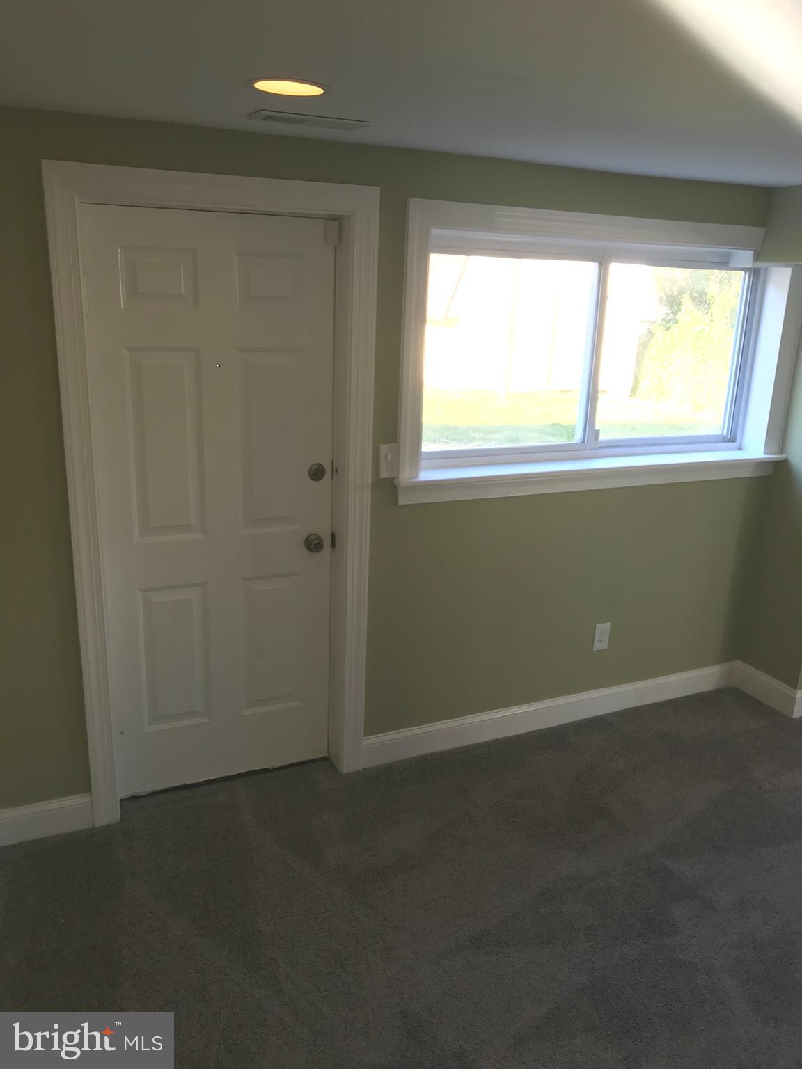 7806 Selgrave Road Baltimore, MD 21244 - Photo 21 of 25 an empty room with a window