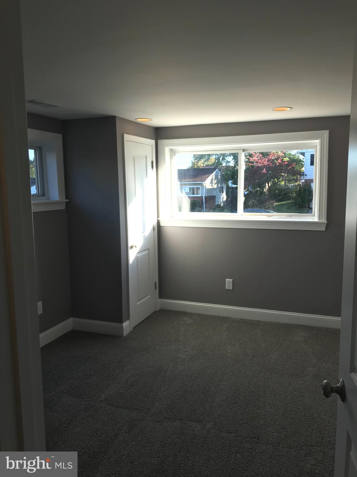 7806 Selgrave Road Baltimore, MD 21244 - Photo 22 of 25 an empty room with window