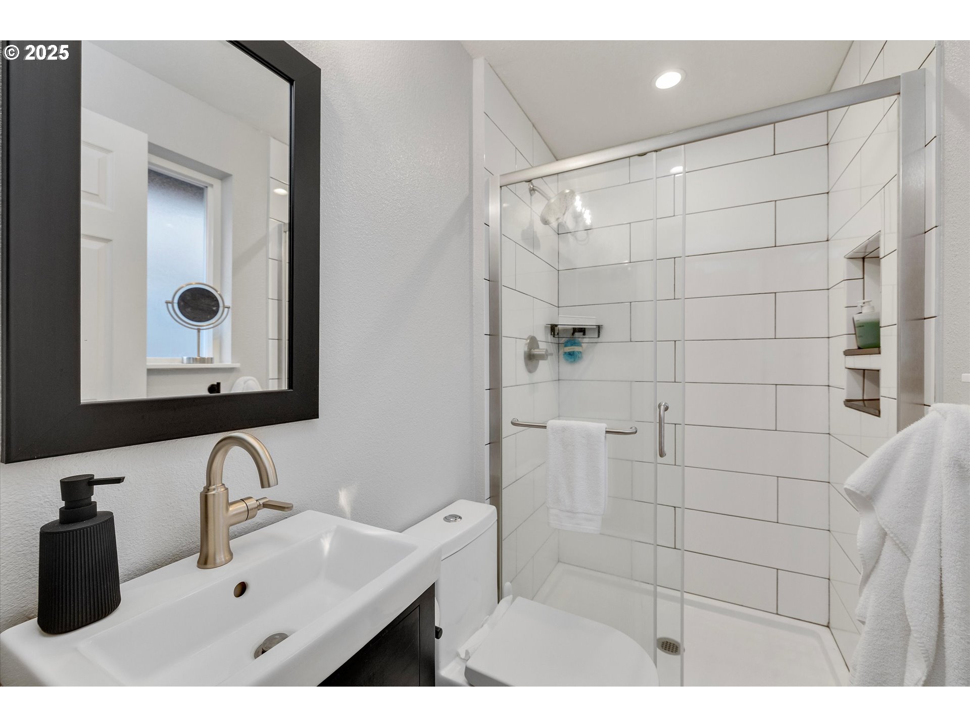 2389 F Street Hubbard, OR 97032 - Photo 19 of 34 a bathroom with a sink a toilet and shower