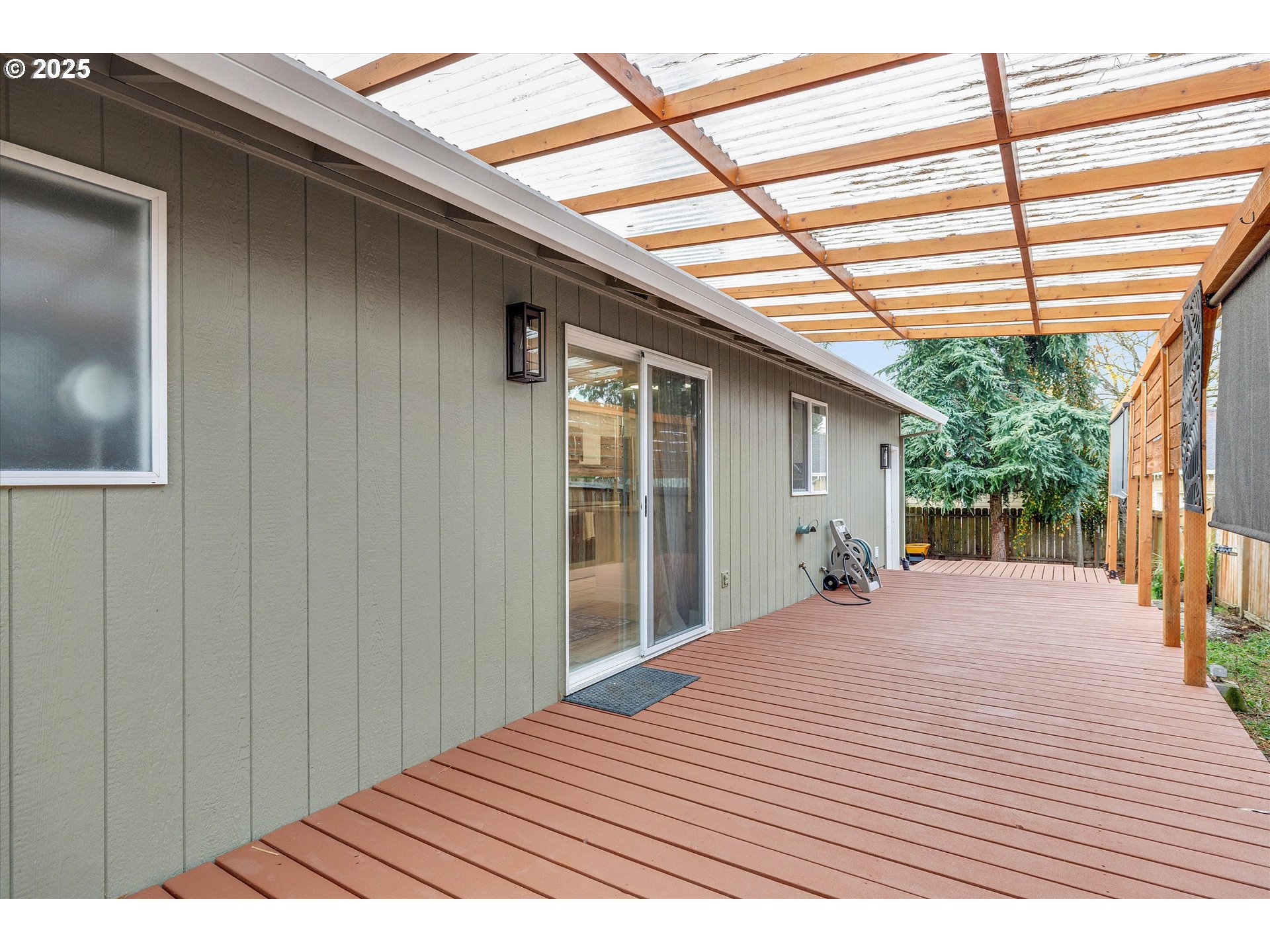 2389 F Street Hubbard, OR 97032 - Photo 20 of 34 a view of backyard with a deck and wooden floor