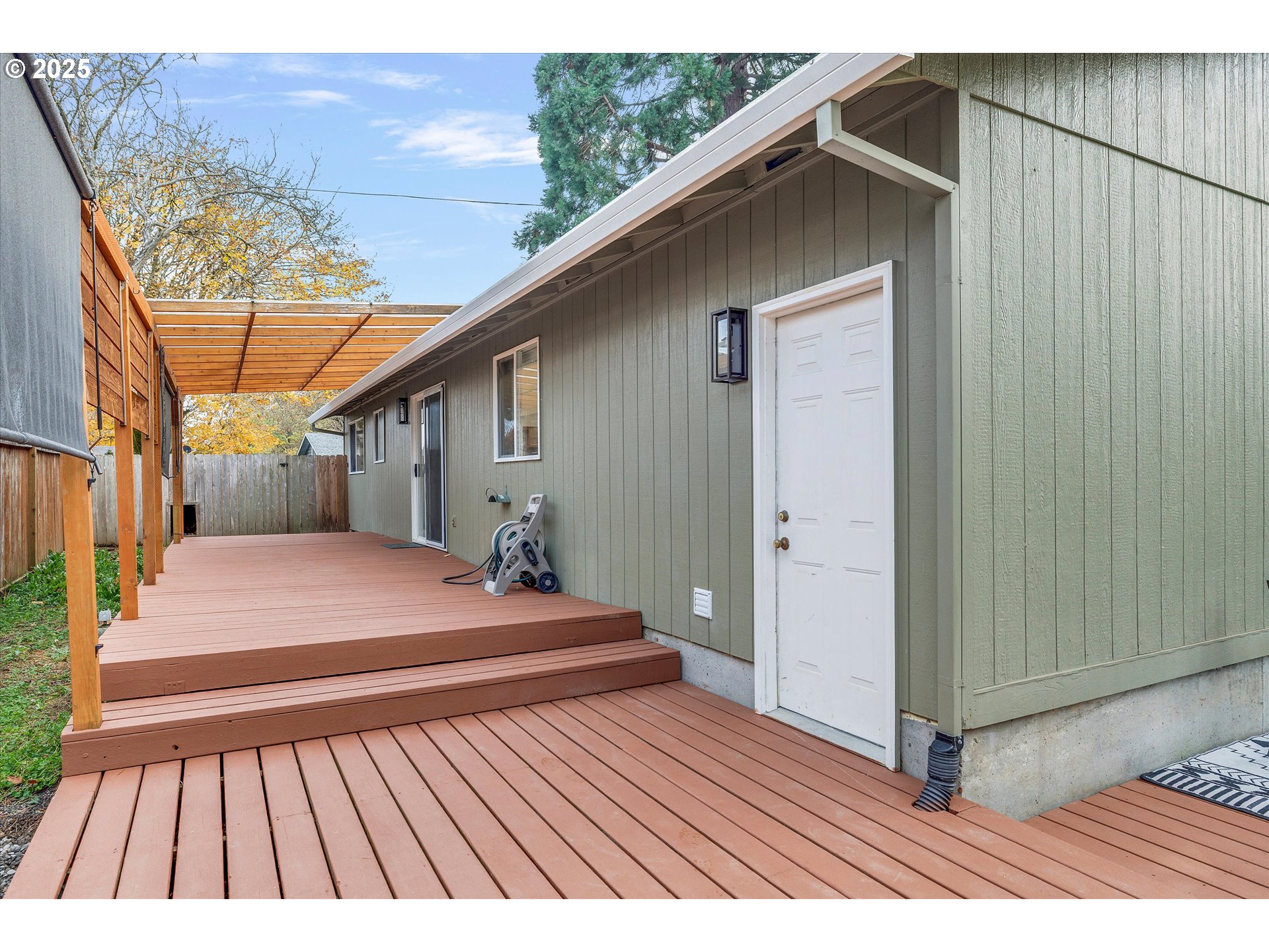 2389 F Street Hubbard, OR 97032 - Photo 22 of 34 a view of backyard with a deck and wooden floor