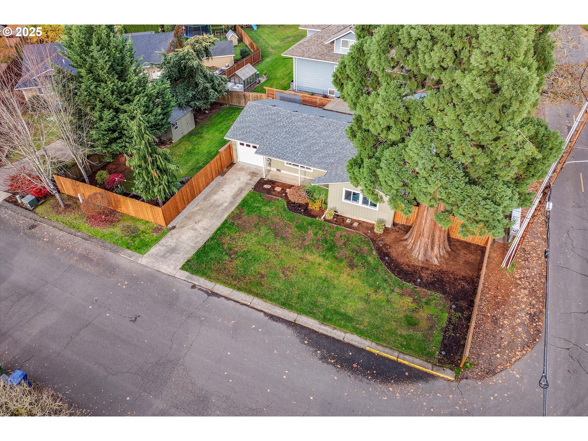 2389 F Street Hubbard, OR 97032 - Photo 31 of 34 a view of a backyard with garden