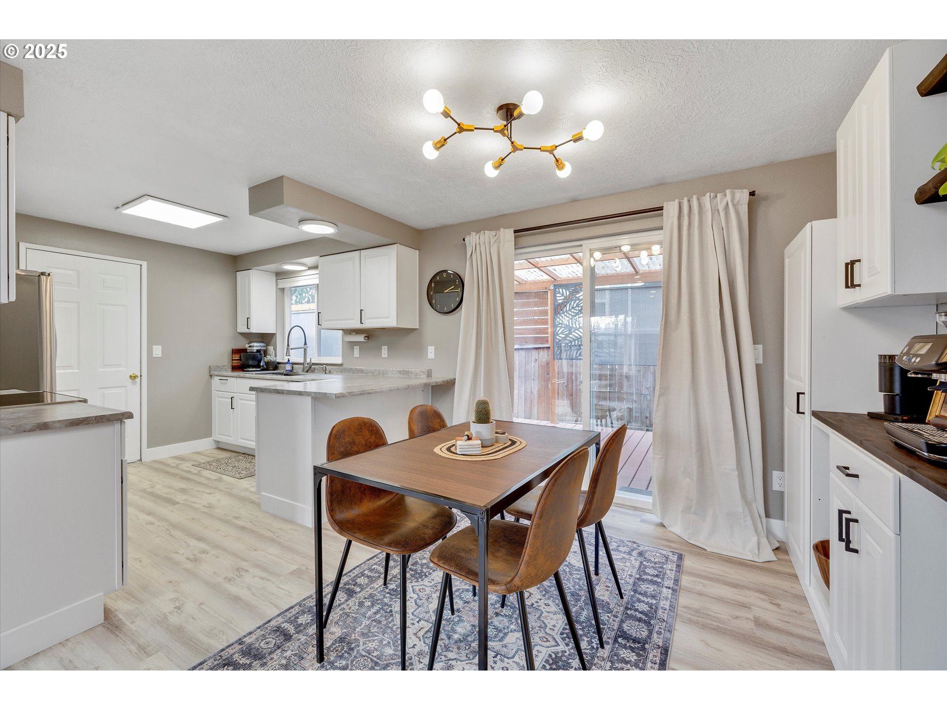 2389 F Street Hubbard, OR 97032 - Photo 8 of 34 a dining room with furniture and window