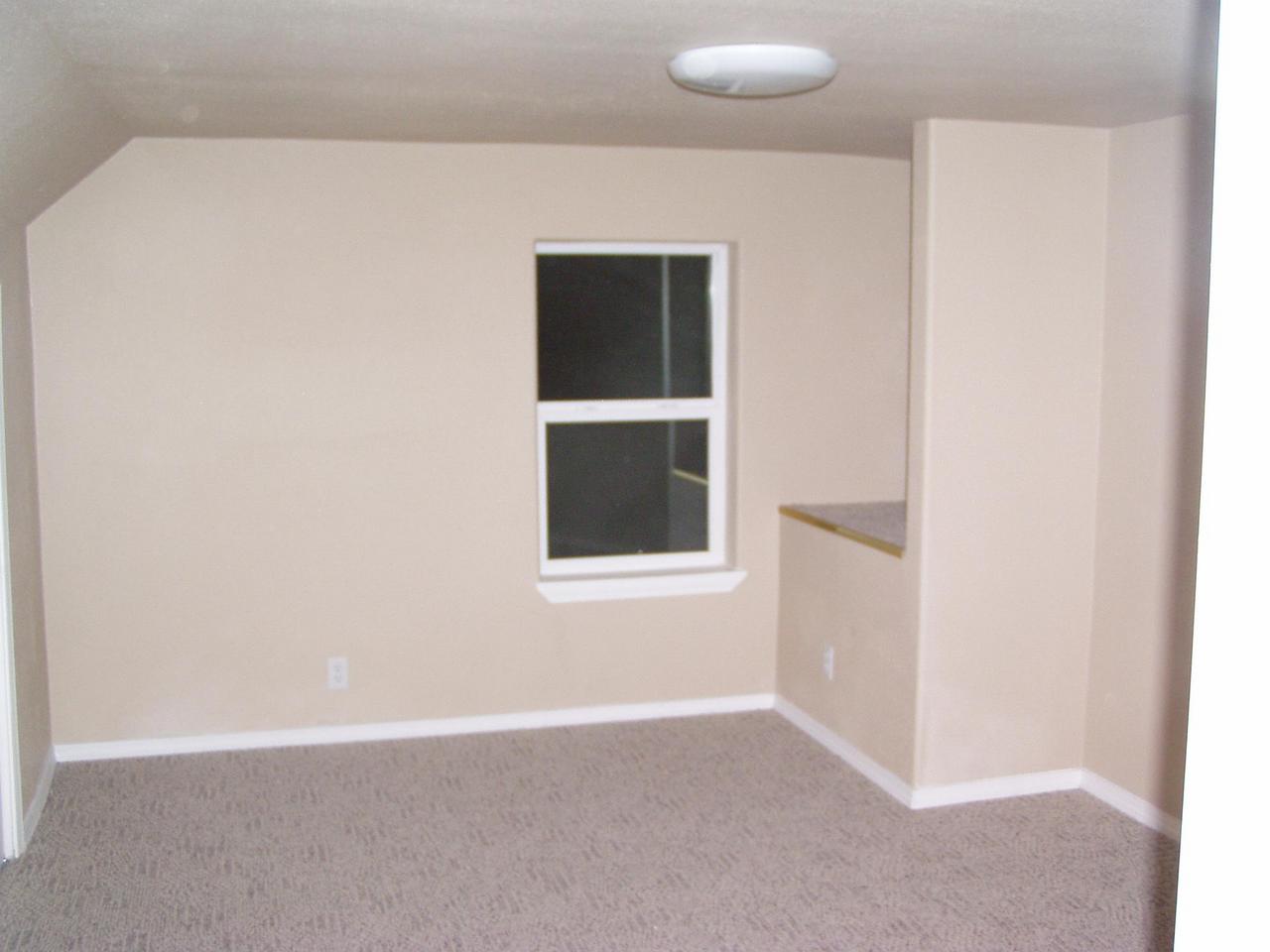 341 Liberty Road Granger, WA 98932 - Photo 14 of 19 a view of an empty room with a window