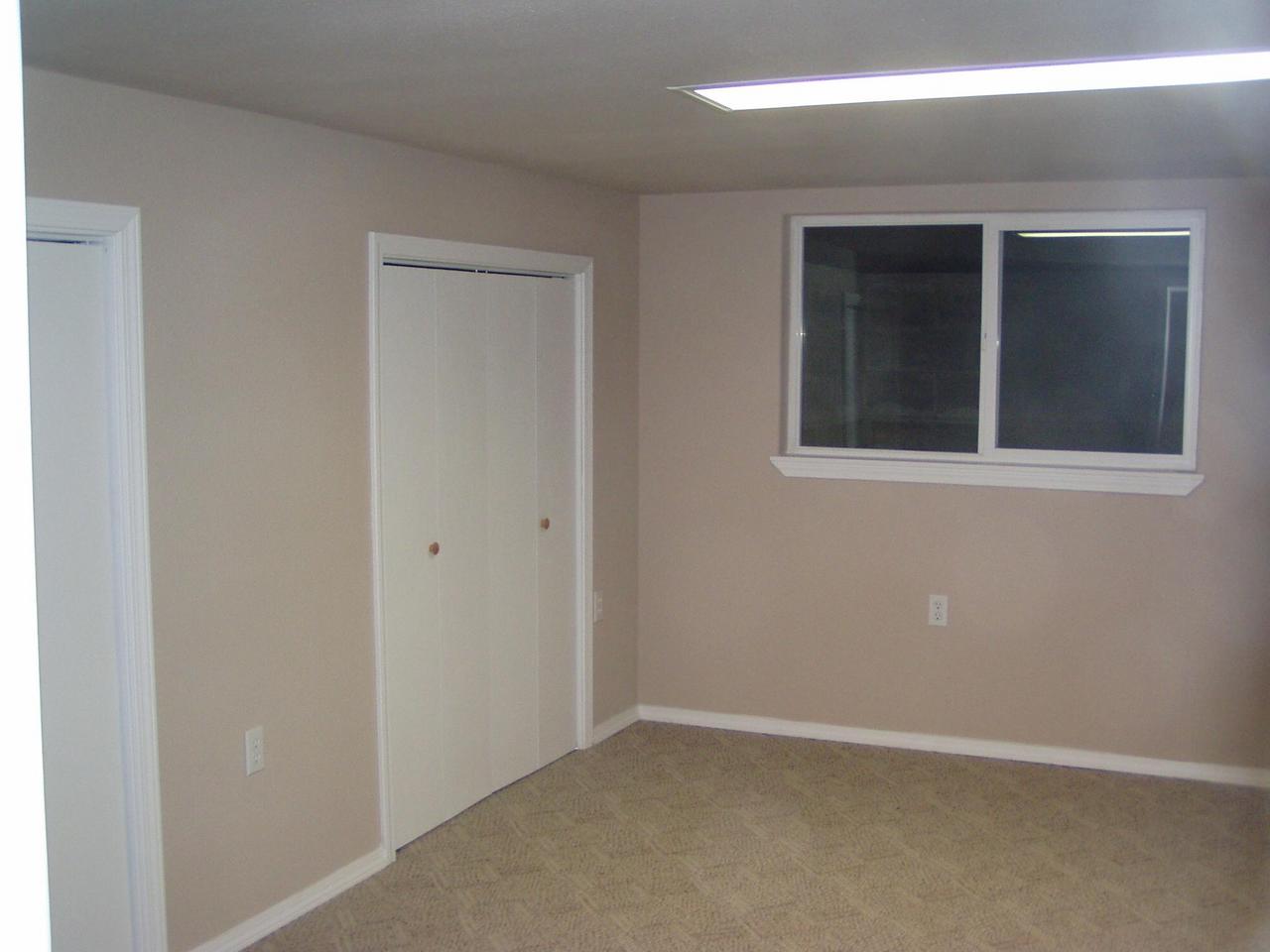 341 Liberty Road Granger, WA 98932 - Photo 17 of 19 a view of an empty room with a window