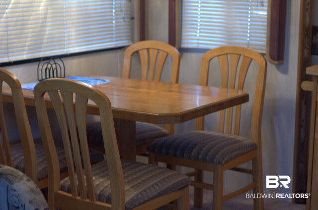 8599 West Fort Morgan Road West Gulf Shores, AL 36542 - Photo 15 of 17 nice dining table