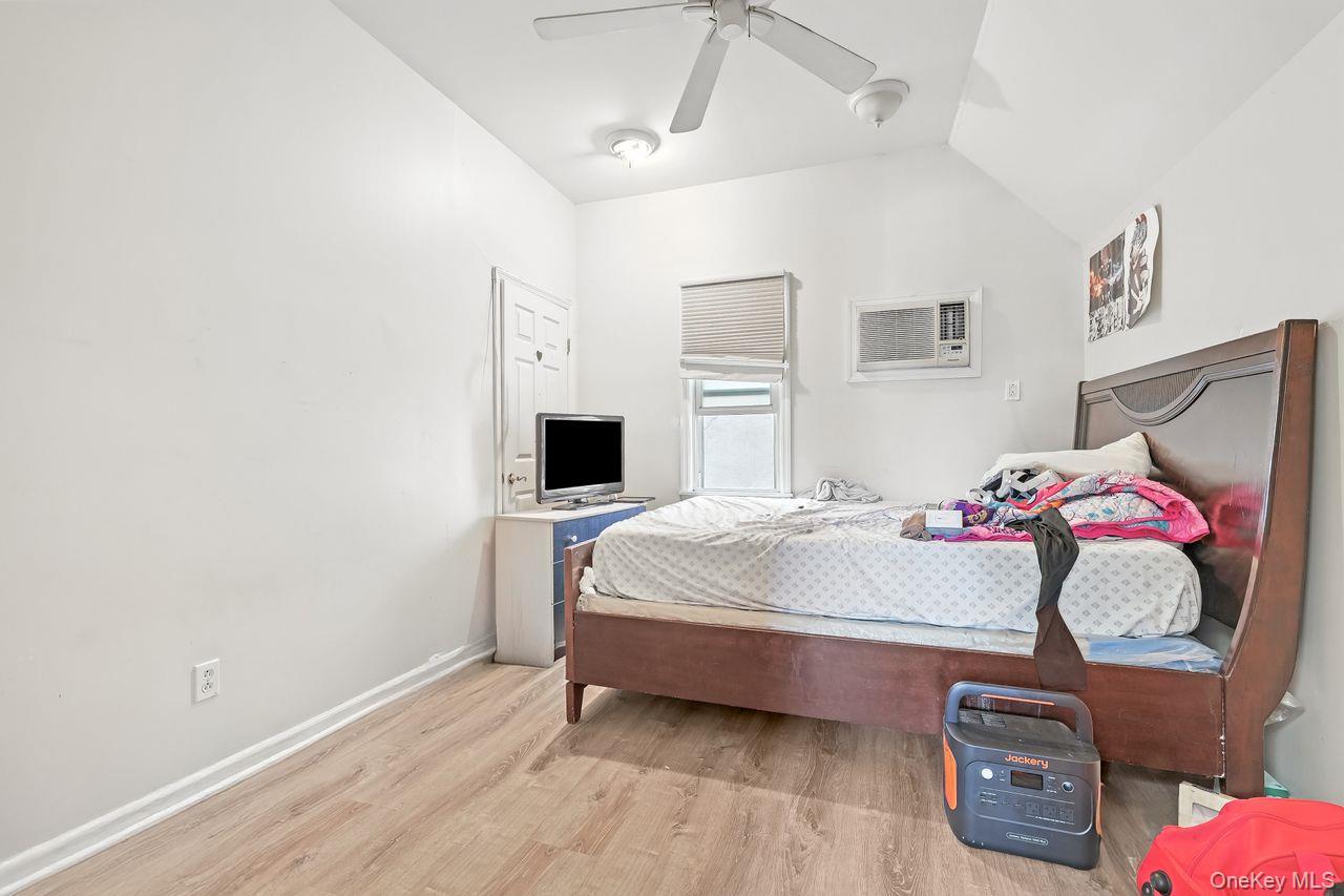 5 Dillon Road Larchmont, NY 10538 - Photo 14 of 36 a bedroom with a bed and a dresser