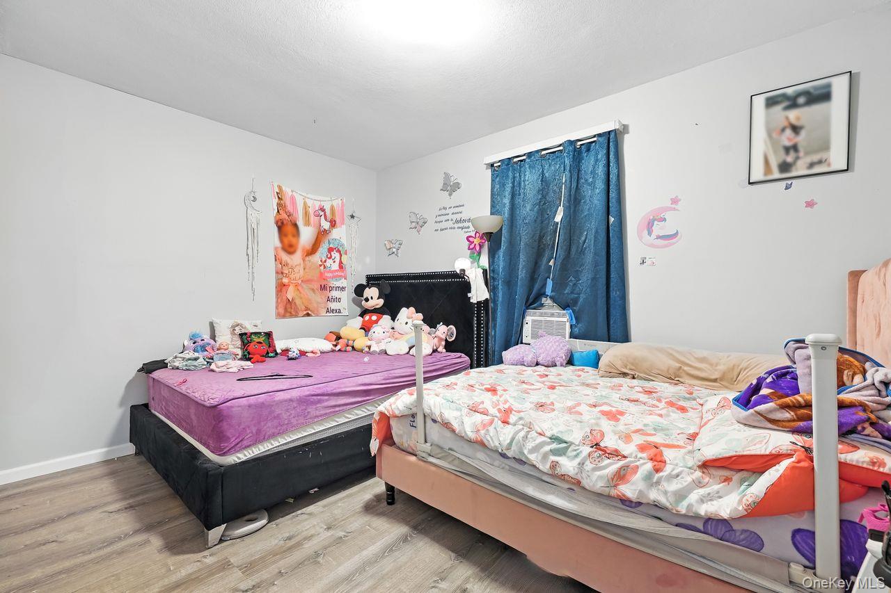 5 Dillon Road Larchmont, NY 10538 - Photo 25 of 36 a bedroom with a bed and dresser