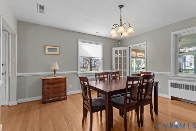 a view of entryway with wooden floor