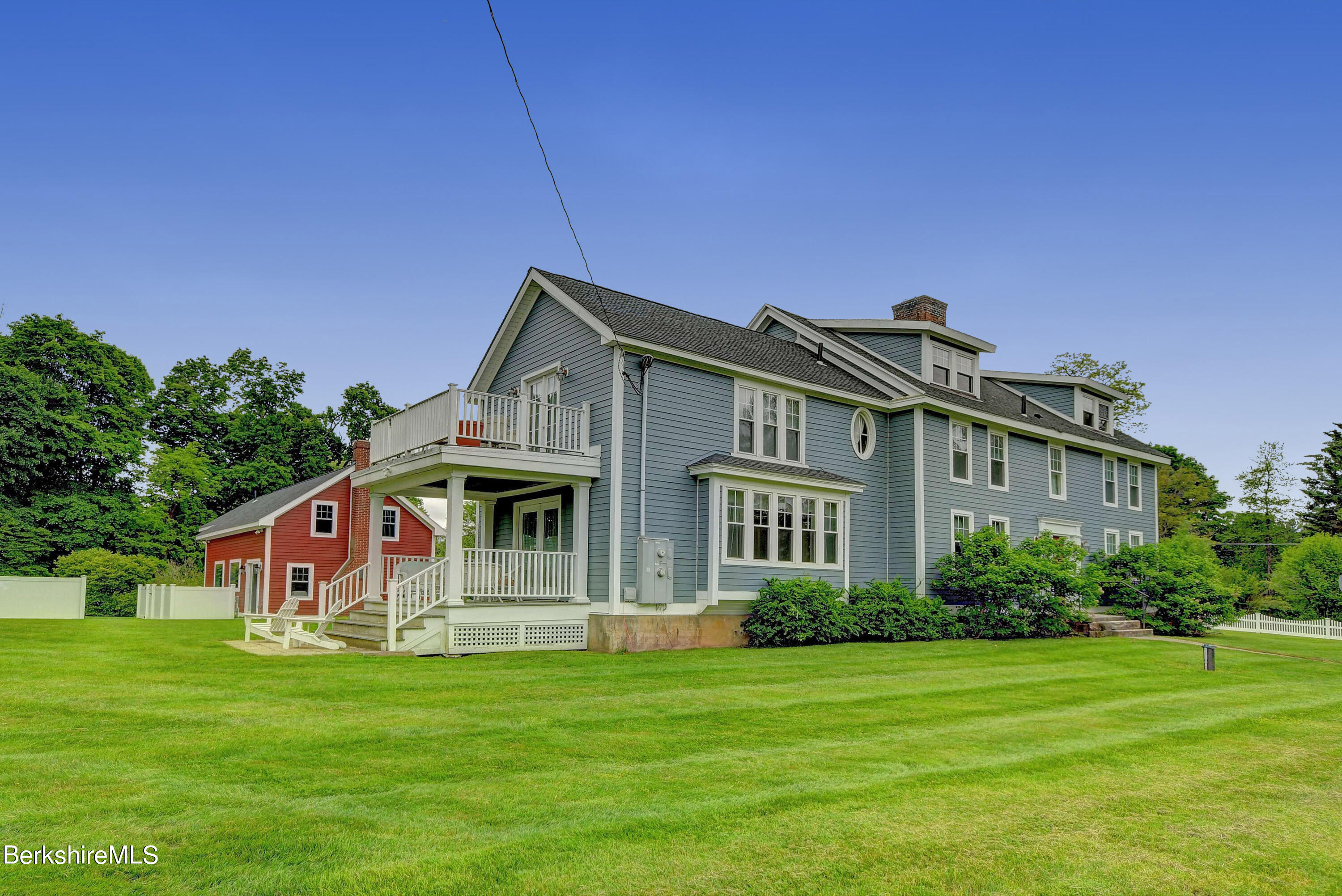1 Devon Road Stockbridge, MA 01262 - Photo 45 of 58 a front view of a house with a garden