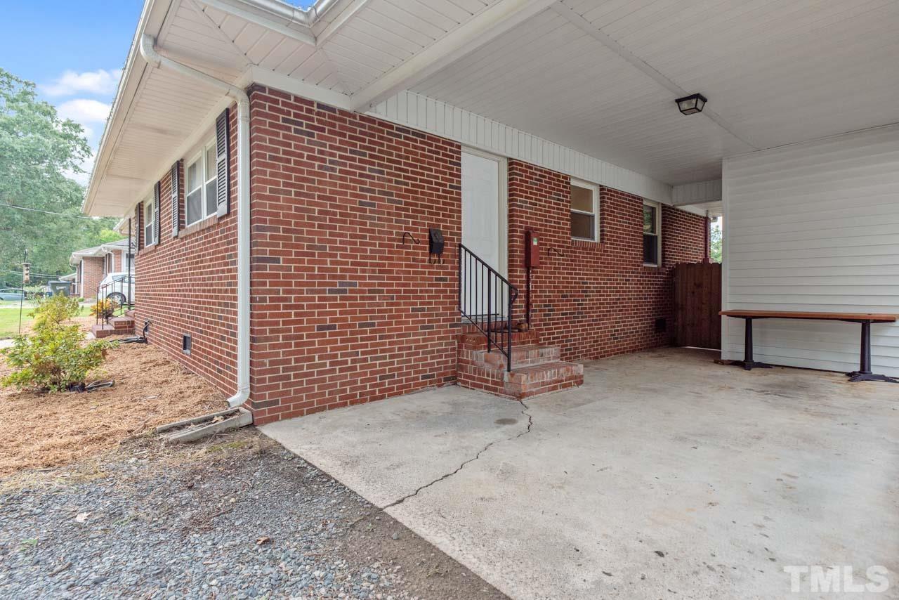 2702 Richwood Road Durham, NC 27705 - Photo 29 of 31 a front view of a house with garden