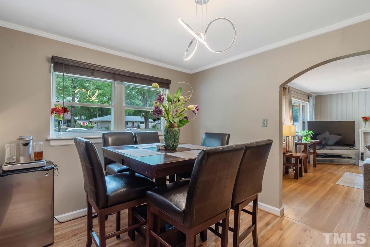 2702 Richwood Road Durham, NC 27705 - Photo 5 of 31 a view of a dining room with furniture window and outside view