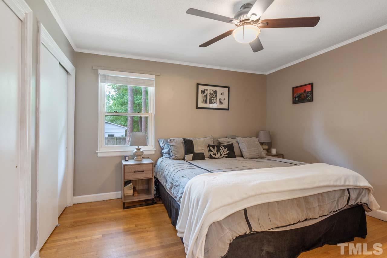 2702 Richwood Road Durham, NC 27705 - Photo 9 of 31 a bedroom with a bed and a window