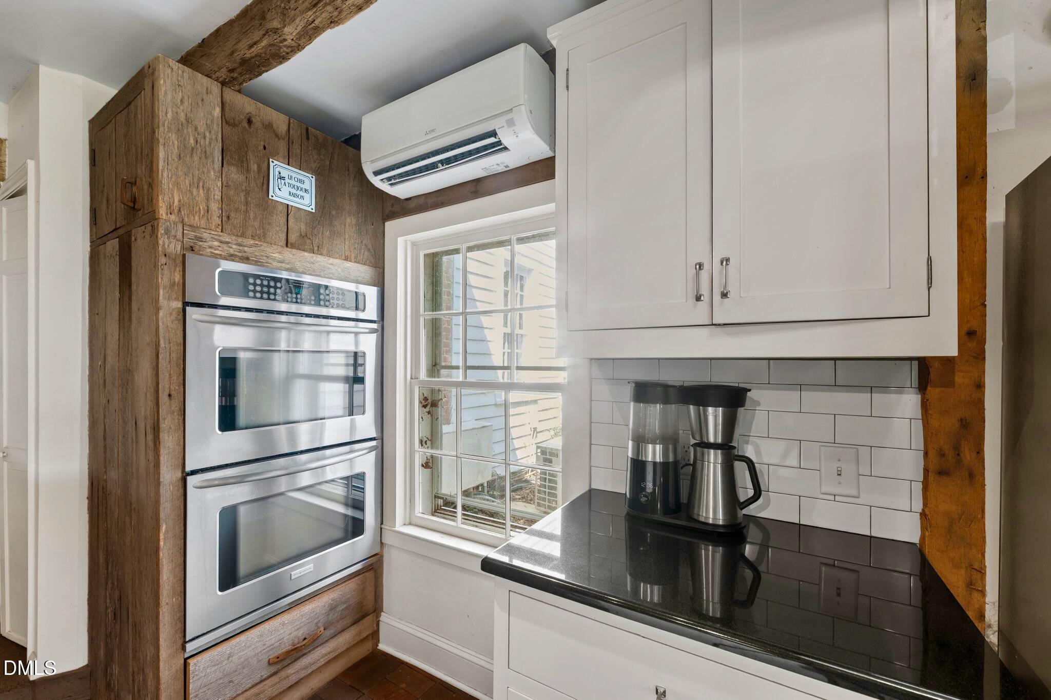 6720 Mebane Oaks Road Mebane, NC 27302 - Photo 23 of 85 a kitchen with a sink and stainless steel appliances