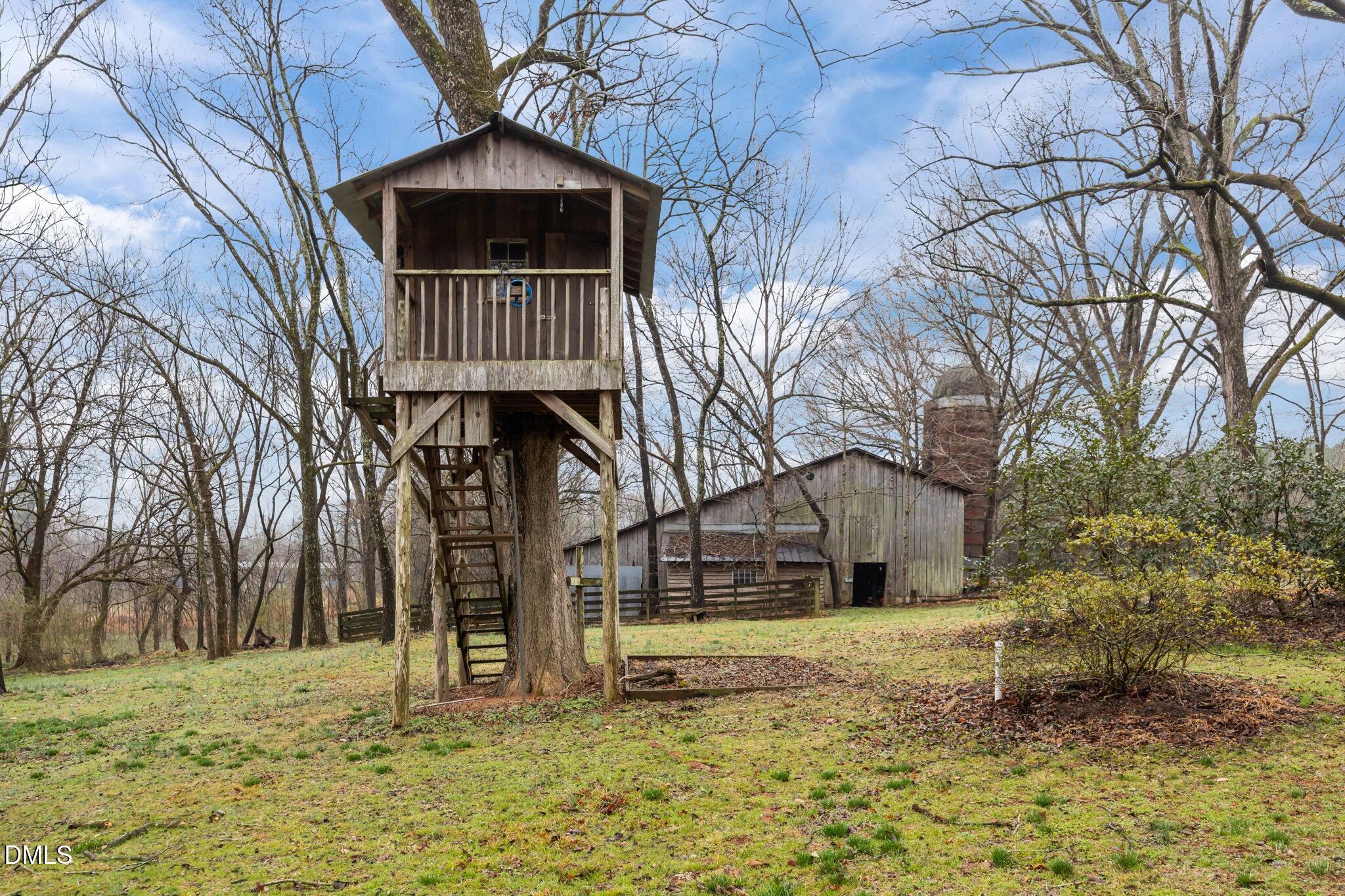 6720 Mebane Oaks Road Mebane, NC 27302 - Photo 79 of 85 a front view of a house with a yard