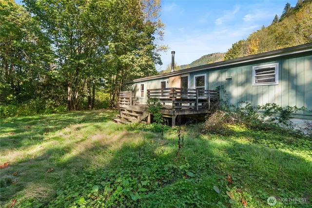 a view of a room with wooden walls
