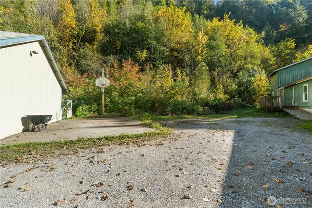 a backyard of a house with lots of green space