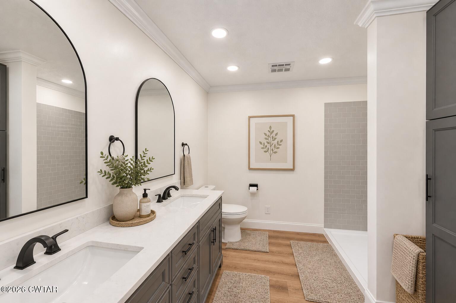 669 Walker Road Jackson, TN 38305 - Photo 23 of 32 a bathroom with a sink and a mirror