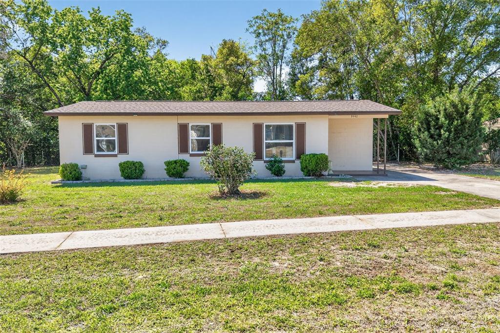 9440 North Milam Way Citrus Springs, FL 34434 - Photo 1 of 1 a view of a house with a yard