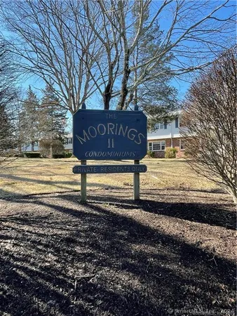 a view of a street with trees
