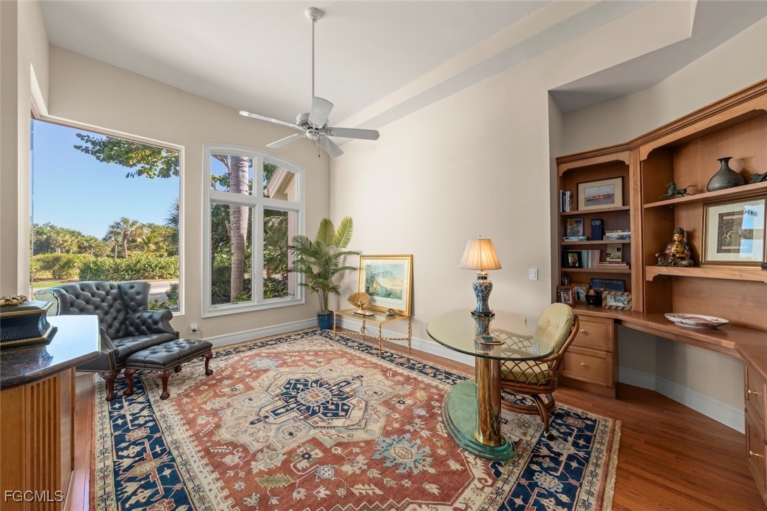 2417 Wulfert Road Sanibel, FL 33957 - Photo 11 of 50 a living room with furniture a rug and a large window