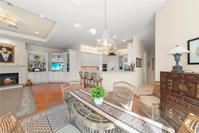 a bedroom with a bed and a potted plant