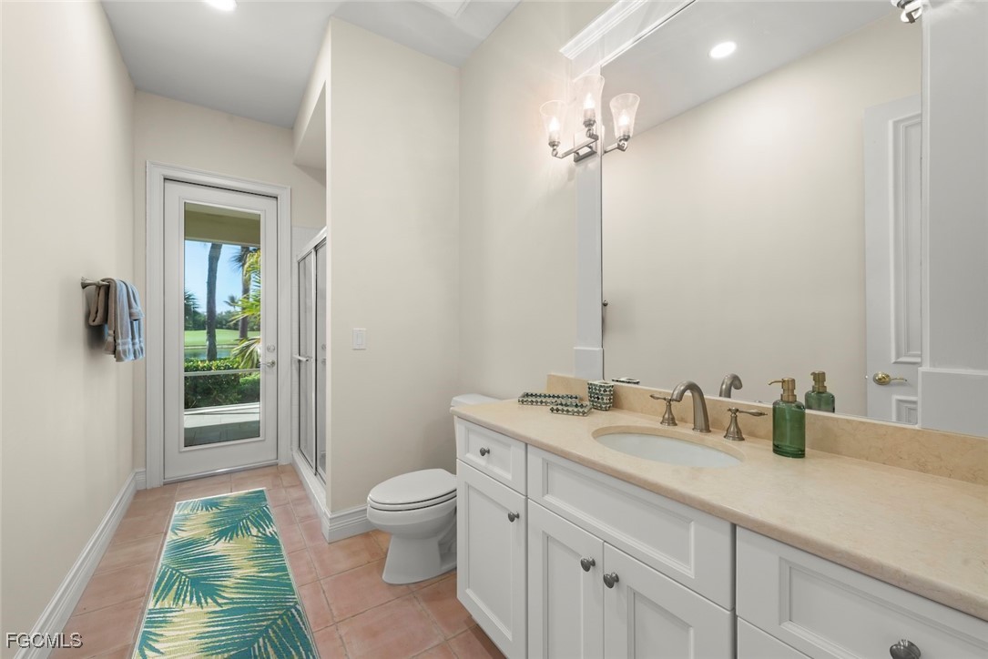 2417 Wulfert Road Sanibel, FL 33957 - Photo 37 of 50 a bathroom with a sink a toilet and shower