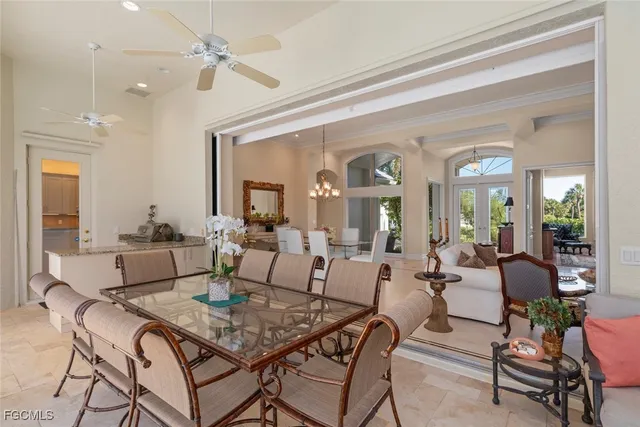 a view of a patio with a table and chairs