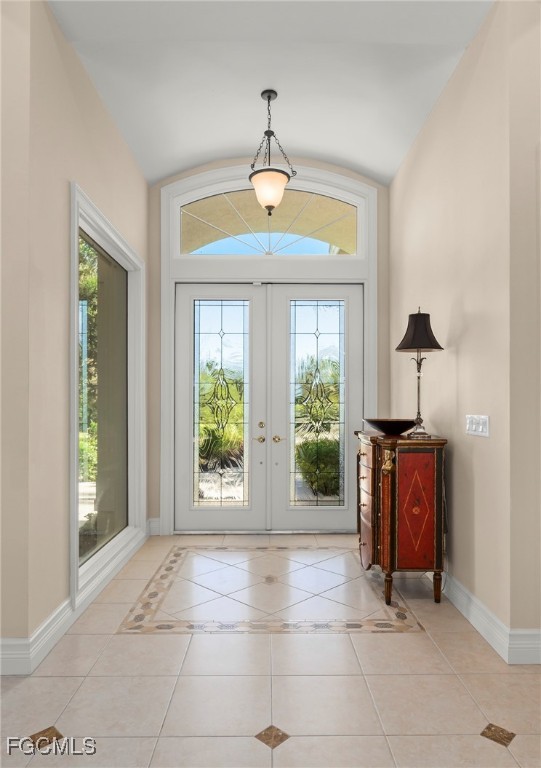 2417 Wulfert Road Sanibel, FL 33957 - Photo 4 of 50 a view of an entryway with a chandelier