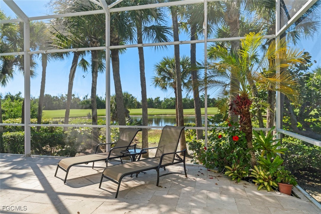 2417 Wulfert Road Sanibel, FL 33957 - Photo 45 of 50 a view of a yard with a table and chairs