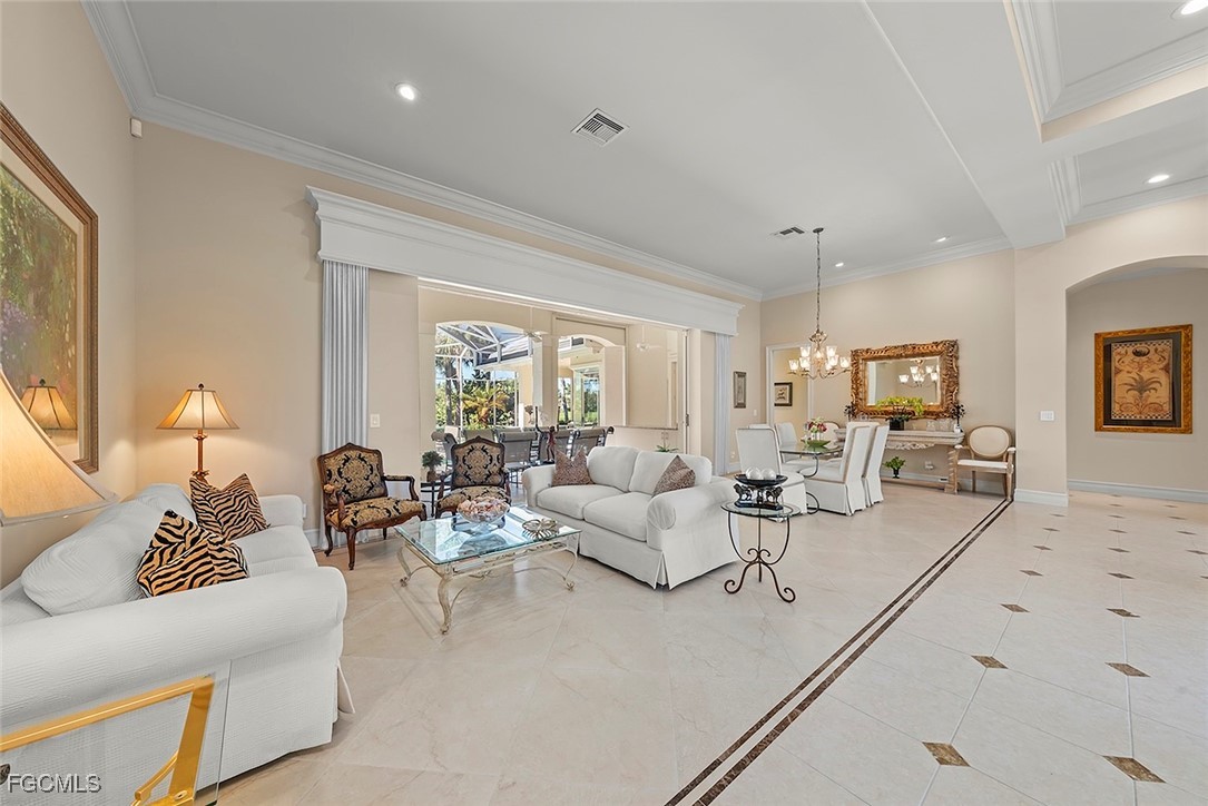 2417 Wulfert Road Sanibel, FL 33957 - Photo 6 of 50 a living room with furniture and a large window