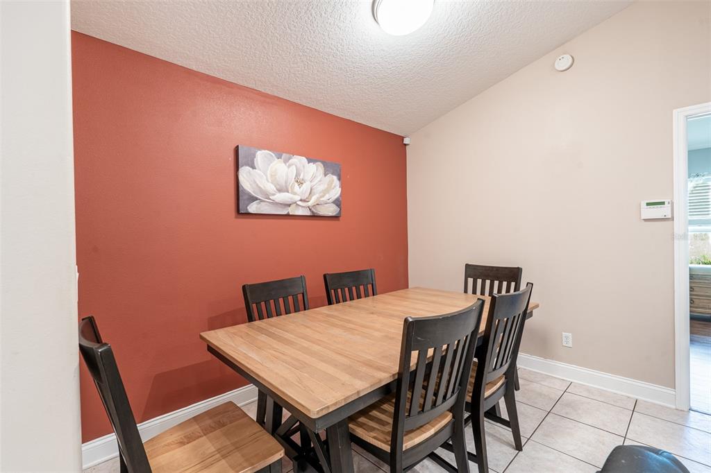 18301 South Obrien Road Groveland, FL 34736 - Photo 11 of 35 a view of a dining room with furniture