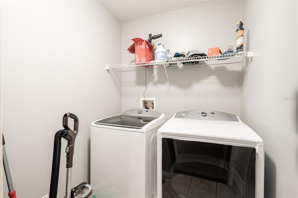 18301 South Obrien Road Groveland, FL 34736 - Photo 15 of 35 a utility room with dryer and washer