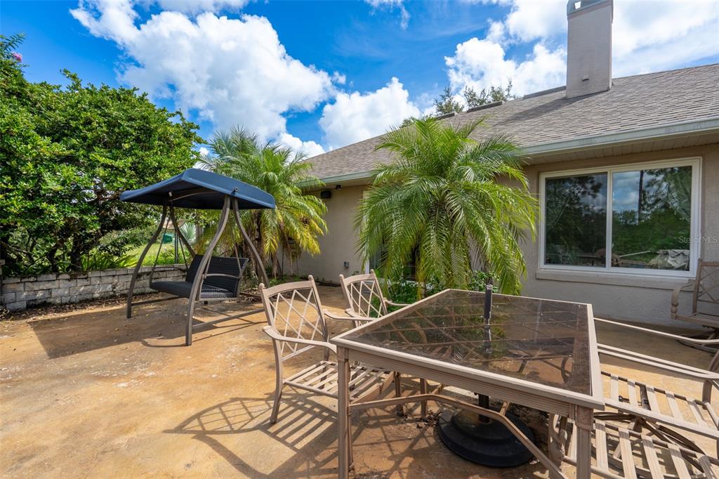 18301 South Obrien Road Groveland, FL 34736 - Photo 17 of 35 a view of backyard with swimming pool and furniture