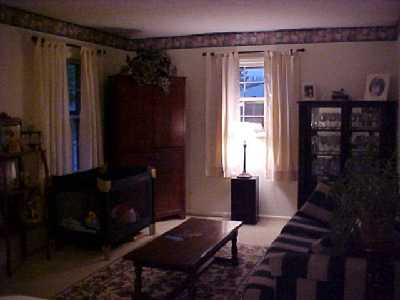 The living room measures approx. 17' x 1